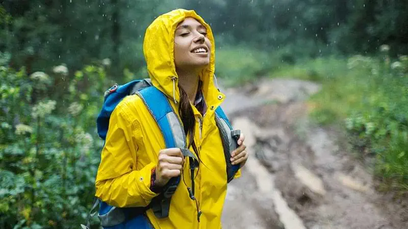 woman_hiker_rain_raincoat