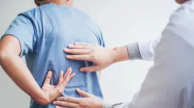 چه ارتباطی بین یبوست و کمردرد وجود دارد؟