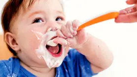 نوزادان از چه زمانی می توانند ماست بخورند؟