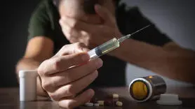 ترک اعتیاد به سبک طالبان!