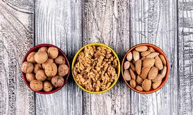 بادام یا گردو کدام برای سلامتی مفیدتر است؟ + جدول مقایسه ارزش غذایی 