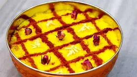 طرز تهیه شعله زرد دسری سنتی با عطر زعفران و گلاب