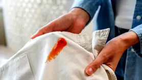 10 روش مؤثر برای پاک کردن لکه چربی از روی لباس