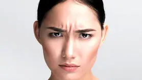 علل بوجود آمدن خط اخم و راههای محو آن از صورت