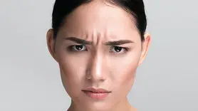 علل بوجود آمدن خط اخم و راههای محو آن از صورت