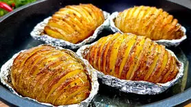 فیلم/ طرز تهیه سیب زمینی تنوری با طعم سیر و کره + فوری و ارزان و بدون گوشت