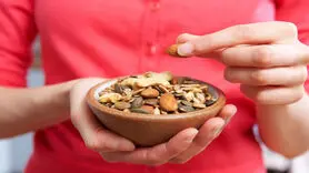 این آجیل خوشمزه سم مرموزی را وارد بدن می کند + شیوه درست مصرف