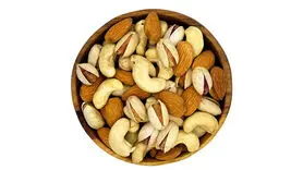 سوزاندن چربی شکم با خوردن این 3 مغز آجیل 